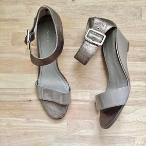 Metallic silver and patent leather heel Size 10